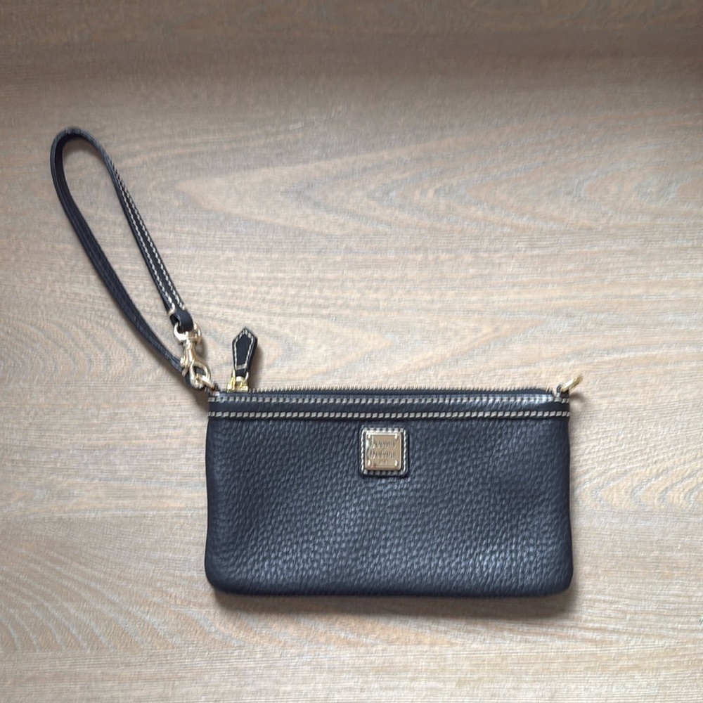 Black calfskin leather Dooney & Burke wristlet clutch purse.